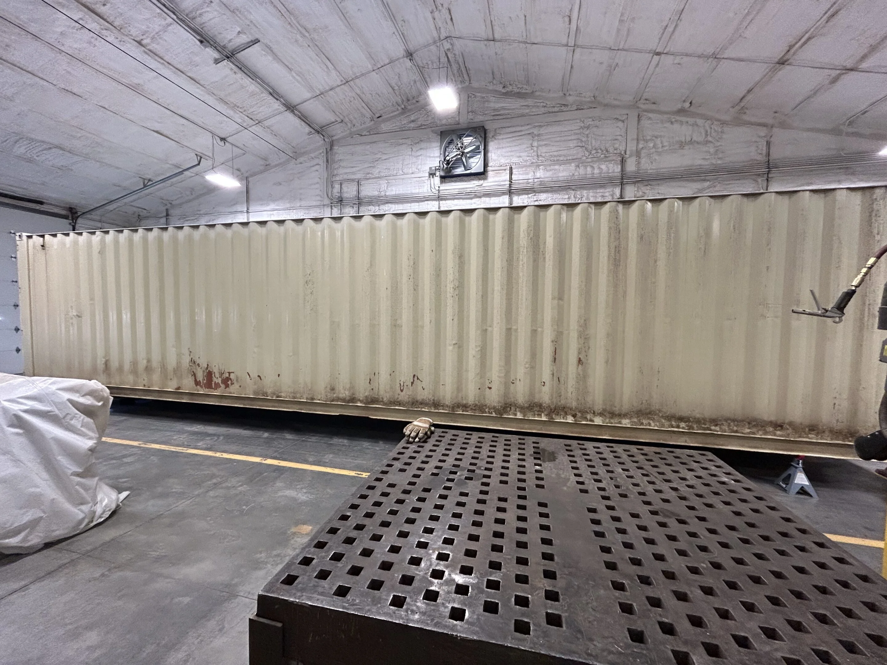 Roll-up door modification added to standard shipping container